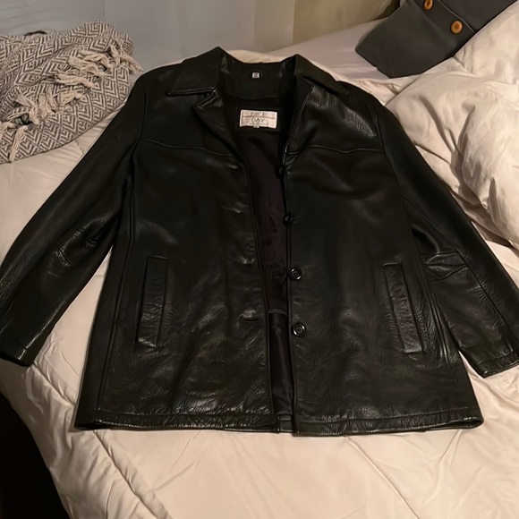 Thick leather jacket. Fur arms so very warm! - Picture 1 of 2